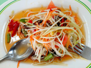 Green papaya salad with cherry tomatoes and peanuts